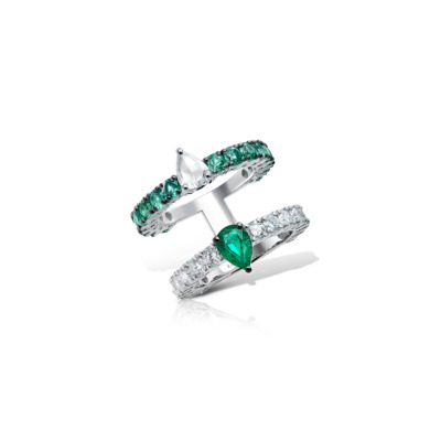 Double eternity ring featuring green and clear gemstones set in silver.