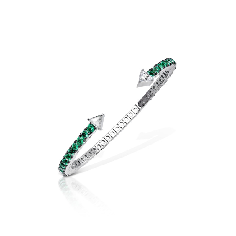Silver bangle with green stones and triangular ends, featuring a sleek design.
