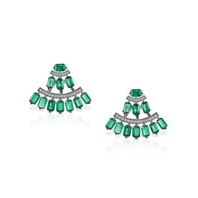 Pair of fan-shaped earrings featuring emerald and clear stones arranged in a tiered design.
