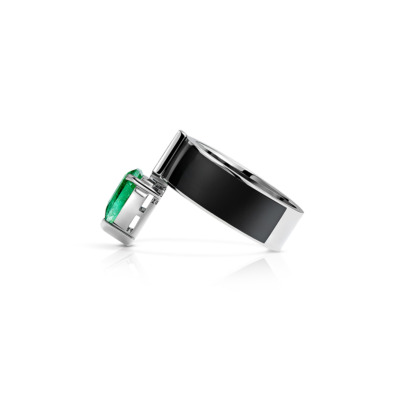Viridi ring featuring a kite cut emerald set in a sleek band.