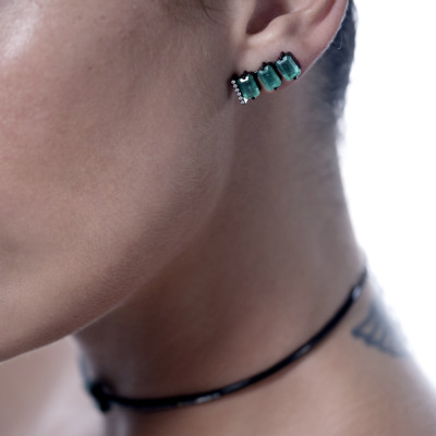 Elegant Linette earrings featuring three green gemstones and sparkling accents, perfect for adding a touch of sophistication to any outfit.