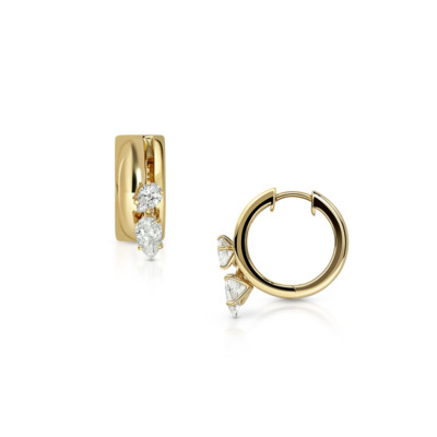 Elegant gold hoop earrings featuring three sparkling diamonds, showcasing a modern design suitable for various occasions.