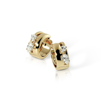 Elegant gold hoop earrings featuring sparkling diamonds, perfect for adding a touch of luxury to any outfit.