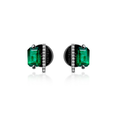 Pair of emerald rectangle stud earrings with silver accents and black background.