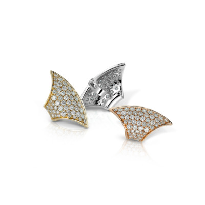 Three earrings featuring diamond embellishments in gold and silver settings.