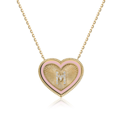 Gold heart-shaped necklace featuring a pink enamel background and a diamond-studded letter M.