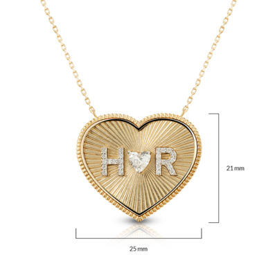 Large heart-shaped necklace featuring diamond solitaire letters 'H' and 'R' on a gold chain.