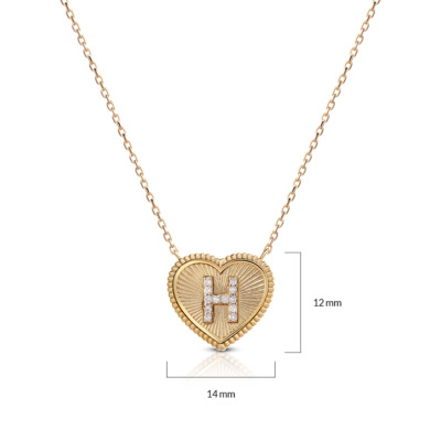 Mini heartbeat necklace featuring a heart pendant with the letter H and diamond accents.