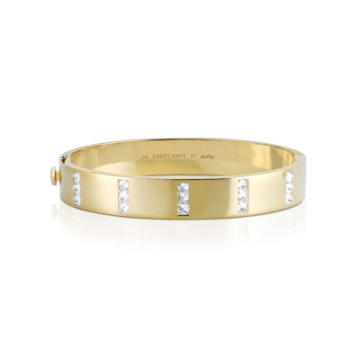 Gold bangle featuring five rows of diamonds set in a sleek design.