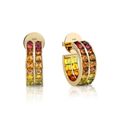 Double row hoop earrings featuring ombre sapphires in various colors set in gold.