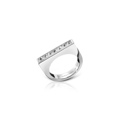 White gold band ring featuring a single row of diamonds set in a straight line.
