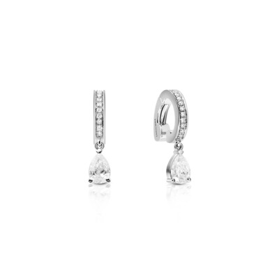 White gold earcuff featuring a pear-shaped diamond pendant and additional small diamonds.
