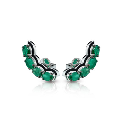 Pair of emerald stud earrings with a silver setting featuring multiple oval-shaped emeralds.
