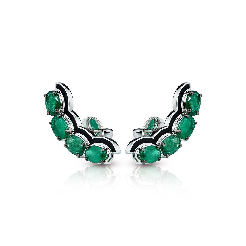 Pair of emerald stud earrings with a silver setting featuring multiple oval-shaped emeralds.