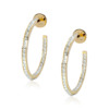 Gold hoop earrings featuring a single row of diamond accents along the outer edge.