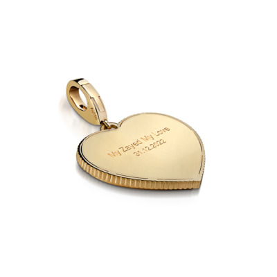 Gold heart charm with engraved text and a smooth surface, featuring a loop for attachment.