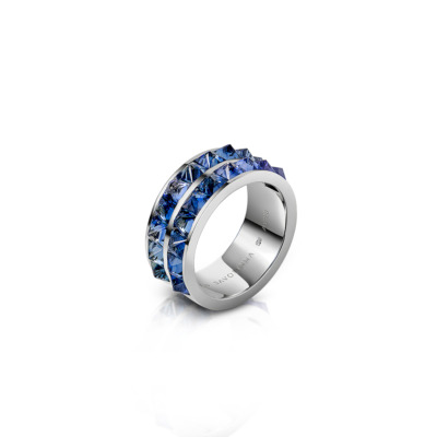 Double row band ring featuring blue sapphires set in a silver band.