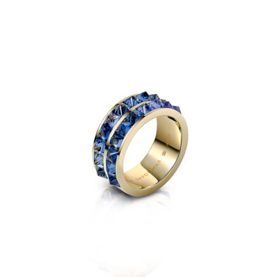 Double row band ring featuring blue sapphires set in a gold band.