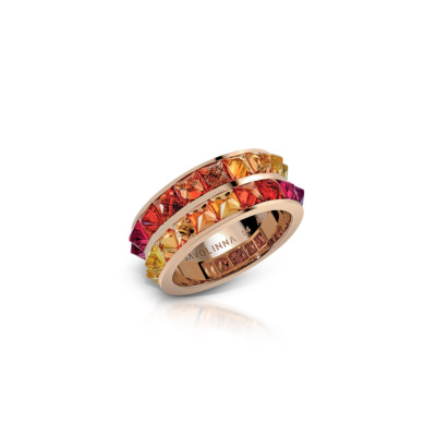 Double row eternity band featuring ombre sapphires in shades of orange, yellow, and purple set in a rose gold band.