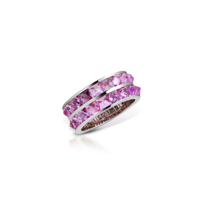 Double row band ring featuring pink sapphires set in a silver band.