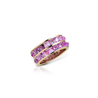 Double row band ring featuring pink sapphires set in yellow gold.