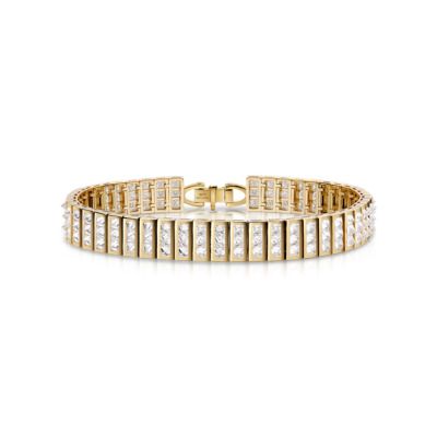 Gold bangle bracelet featuring a row of diamond accents set in a rectangular pattern.