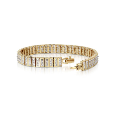 Gold bangle featuring a series of diamonds set in a rectangular pattern.