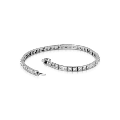 Slim tennis bracelet featuring square diamonds set in white gold with a secure clasp.