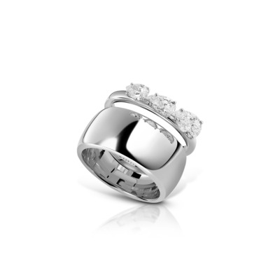 Three stone diamond ring set in white gold with a polished finish.