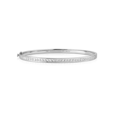 Extra slim white gold bangle with a single row of diamonds set along the band.
