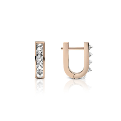 Gold mini huggie earrings featuring a single row of diamonds set in a sleek design.