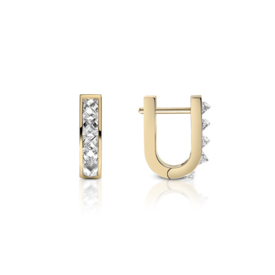 Gold mini huggie earrings featuring a single row of diamonds set in a hoop design.
