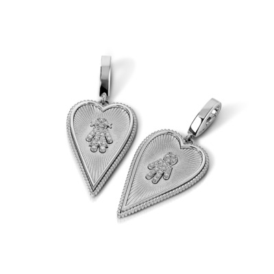 Silver elongated heart charm featuring engraved boy and girl figures on each side.