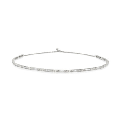 Slim white gold choker necklace with diamond embellishments arranged in a linear pattern.