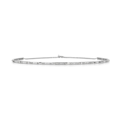 Slim choker necklace featuring diamond accents set in white gold.
