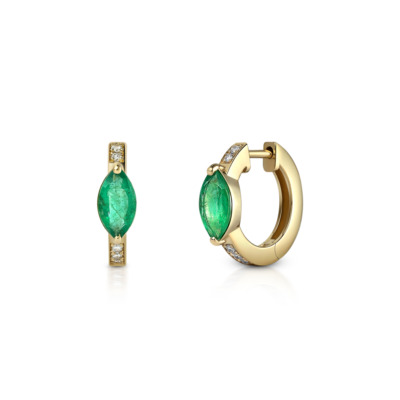Gold huggie earrings featuring emerald marquise stones and small diamonds.