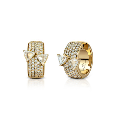 Gold ring featuring triangular diamond accents and a pave setting with smaller diamonds.
