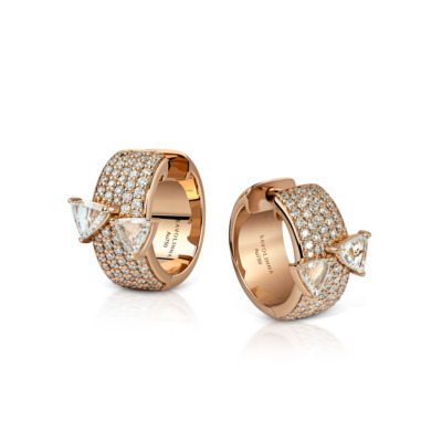 Pair of rose gold huggie earrings adorned with diamonds and triangular gemstones.