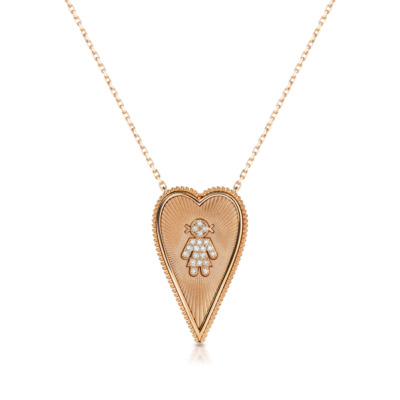 Elongated heart-shaped necklace featuring a custom design with a diamond accent.