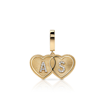 Double heart-shaped charm in gold featuring the initials AS and diamond accents.