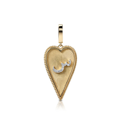 Gold heart-shaped pendant featuring a diamond accent and intricate design.