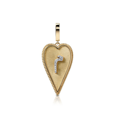 Gold heart-shaped pendant featuring a diamond-accented design in the center.