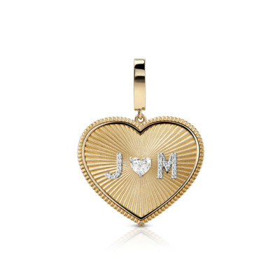 Gold heart charm featuring diamond accents and initials J and M in the center.