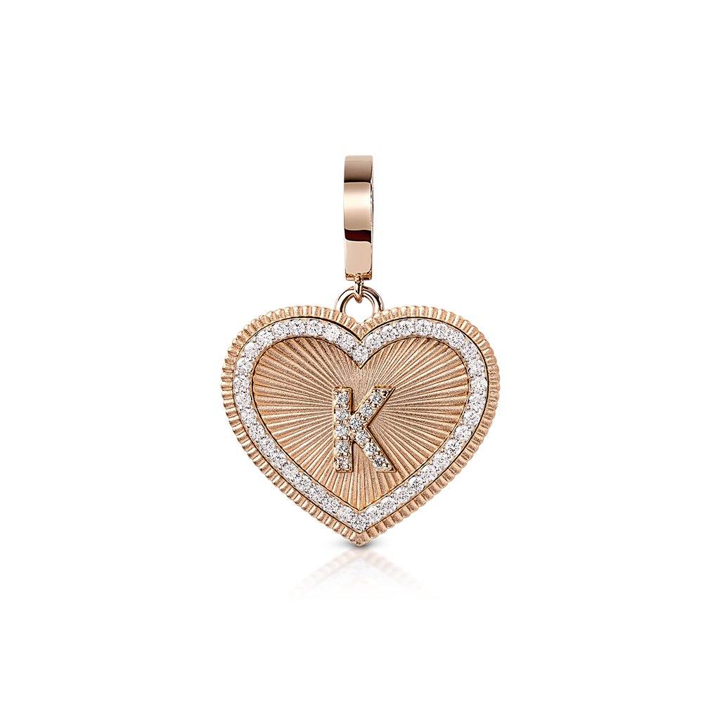 Heart-shaped charm featuring a diamond frame and the letter K in the center.