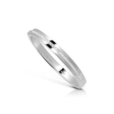 Slim white gold bangle with a single row of small clear stones along one side.