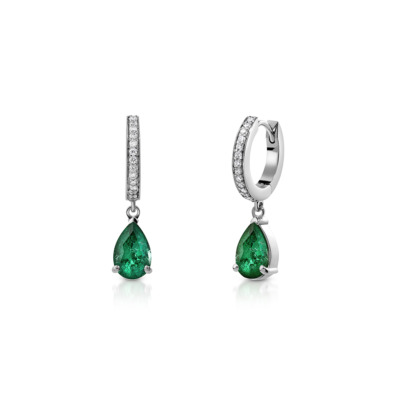 Emerald drop earrings with diamond accents set in silver metal.