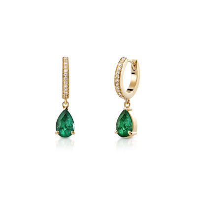 Gold drop earrings featuring pear-shaped emeralds and diamond accents.