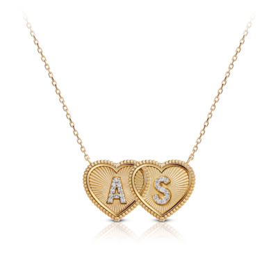 Gold double mini heart necklace featuring the initials A and S with diamond accents.
