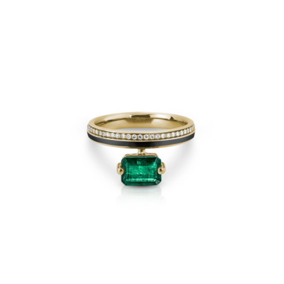 Linette ring featuring an emerald octagon stone set in yellow gold with small diamonds on the band.