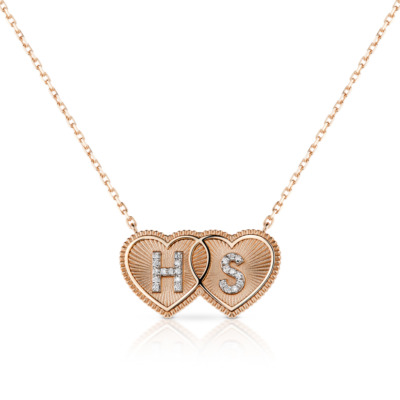 Double mini heart necklace featuring the initials HS in a rose gold finish with diamond accents.